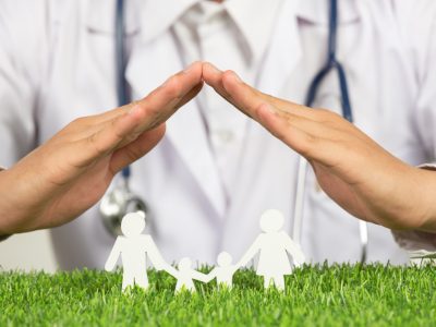 close-up-picture-doctor-s-hands-posting-symbol-home-family-member-model