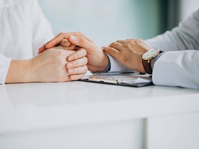 physician-consulting-his-patient-clinic